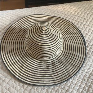 Black, tan and metallic floppy hat